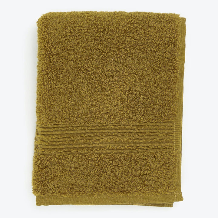 Textured olive green bath towel with horizontal stripes on end.