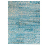 Rectangular rug with gradient blue shades and sporadic light streaks