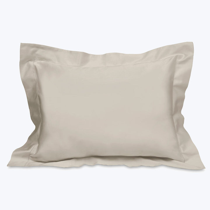 High-quality pillowcase with decorative flange on smooth fabric, white background.