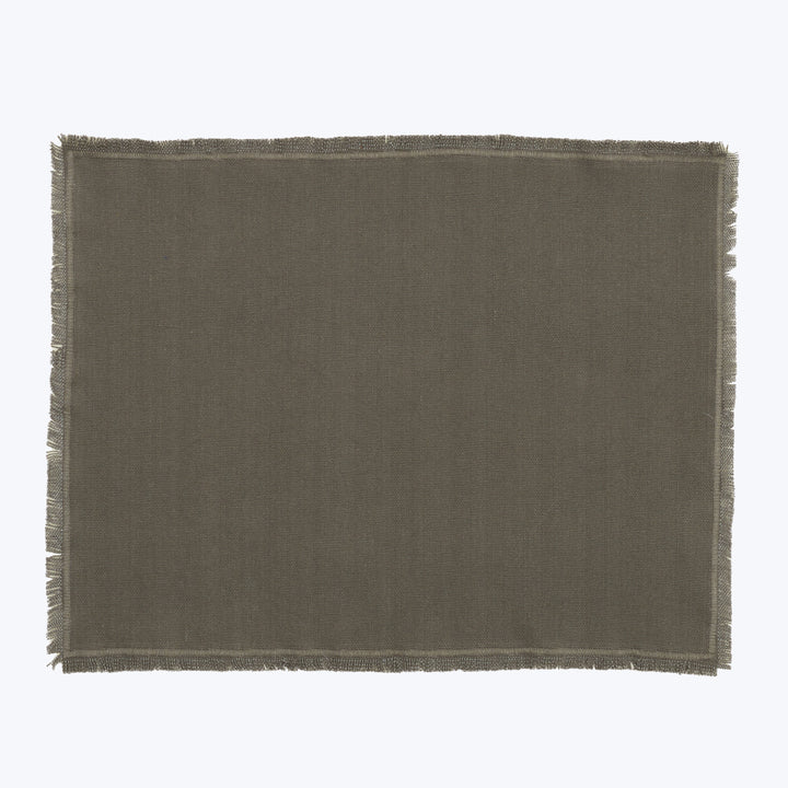 Rectangular woven fabric mat with frayed edges in earthy color.