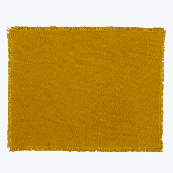 Yellow rectangular fabric with fringed edges, rich mustard color texture.