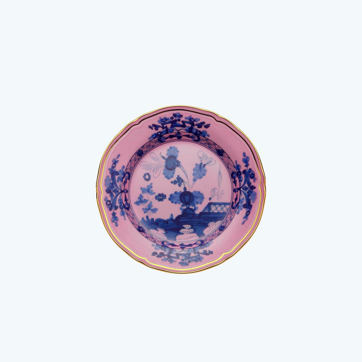 Intricate blue and white decorative plate with floral motifs design