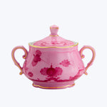 Pink sugar bowl with floral pattern, gold trim and handles.
