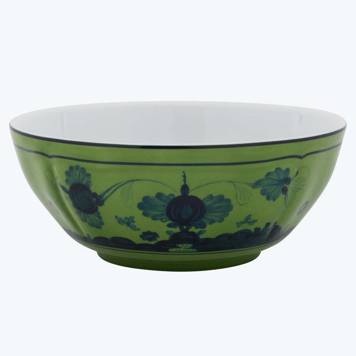 Traditional oriental-style green and white serving bowl with intricate design