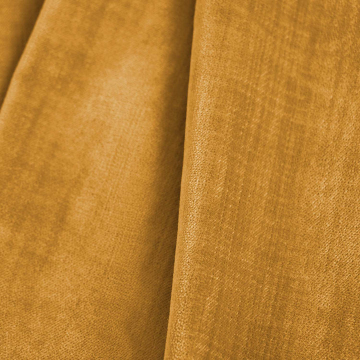 Luxurious golden yellow fabric with visible weave structure and sheen.