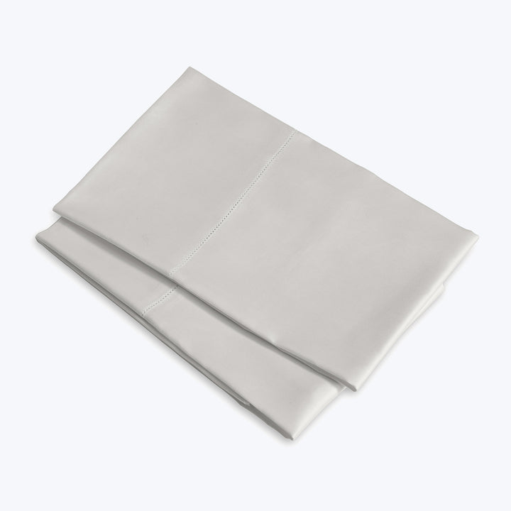 Neatly folded light gray fabric with clean, crisp edges.