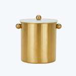 Gold-colored cylindrical container with lid and spherical handles on white