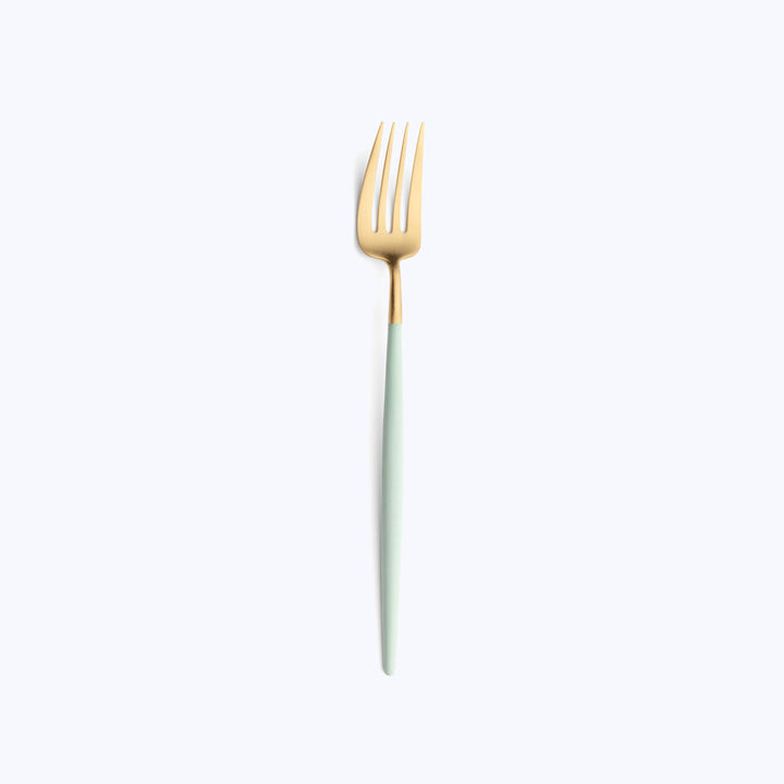 Golden fork with green handle on white background, minimalist design.