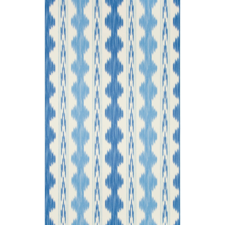 Blue and cream ikat pattern textile with feathered edges.