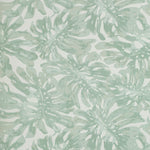 Tropical monstera leaf pattern on pale background, hand-painted watercolor style.