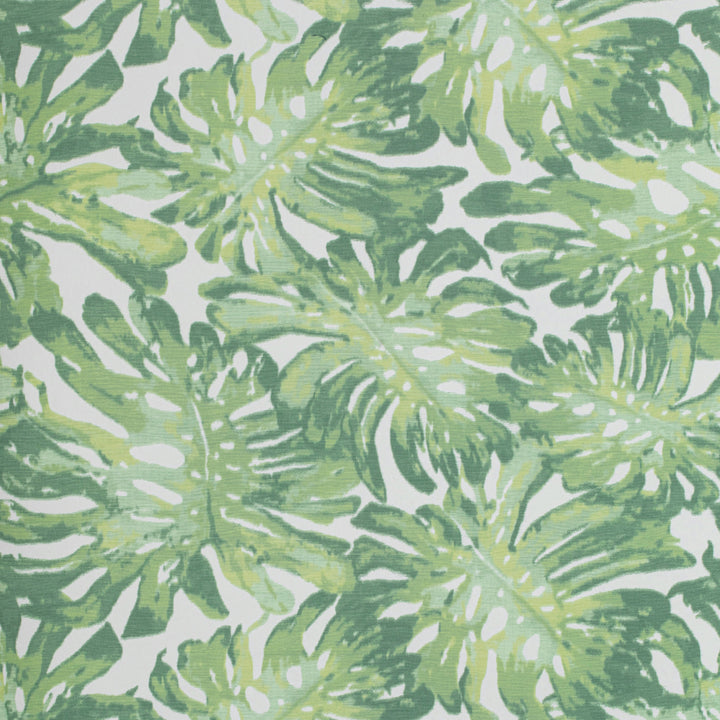 Botanical themed textile pattern with repeated green tropical leaves motif.