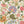 Colorful floral pattern featuring flowers, leaves, and fruits in detail.