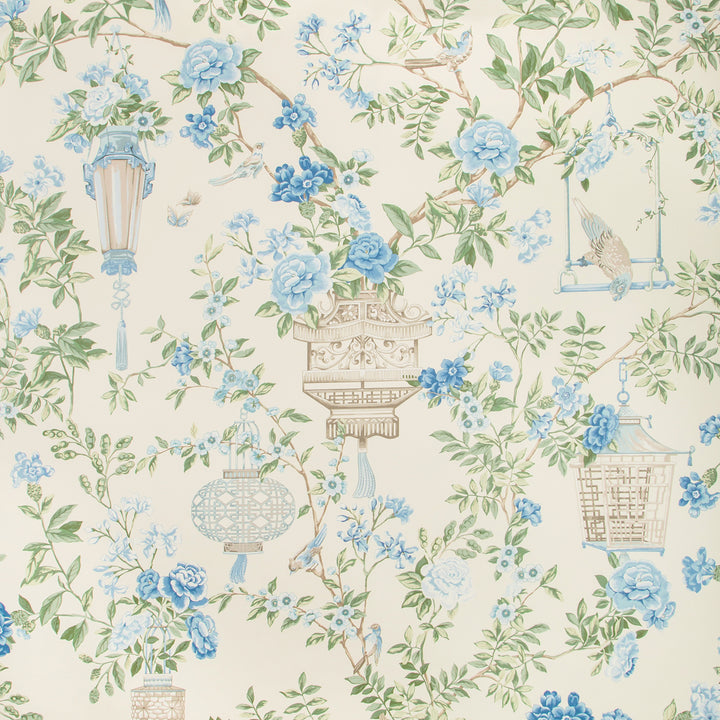 Vintage-inspired wallpaper design with blue florals, green leaves, birdcages.
