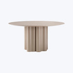 Unique round table with pleated base, minimalist design in cream.