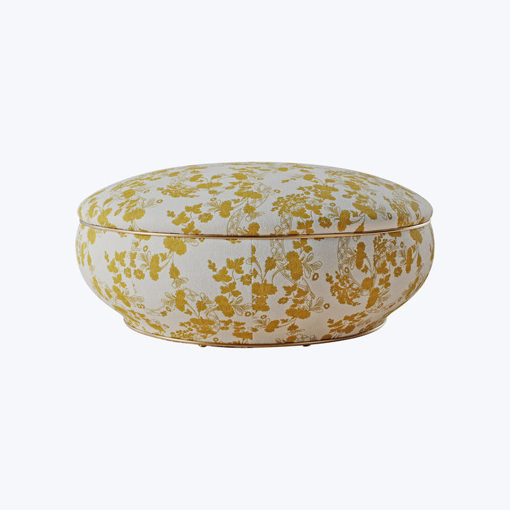 Decorative spherical pot with stylized floral pattern in golden yellow.