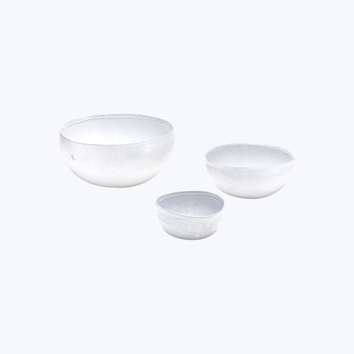 Set of three frosted glass bowls in descending size order.