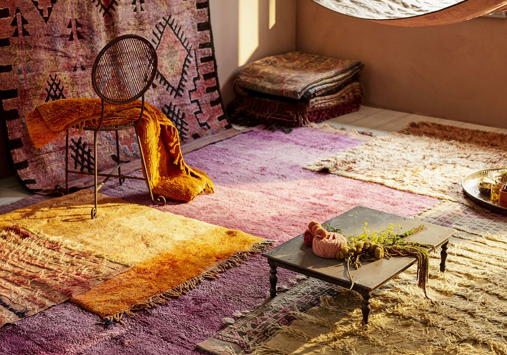 Glimpse into a bohemian-inspired room filled with cozy textures
