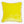 Square yellow decorative pillow with plush texture and fringe trim.