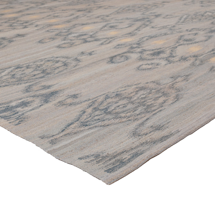 Contemporary off-white carpet with abstract grayish patterns for indoor use.