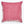 Square pink velvet pillow with slight shade variations, brand tag visible.