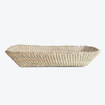Rectangular woven basket made of light-colored, natural fibers.