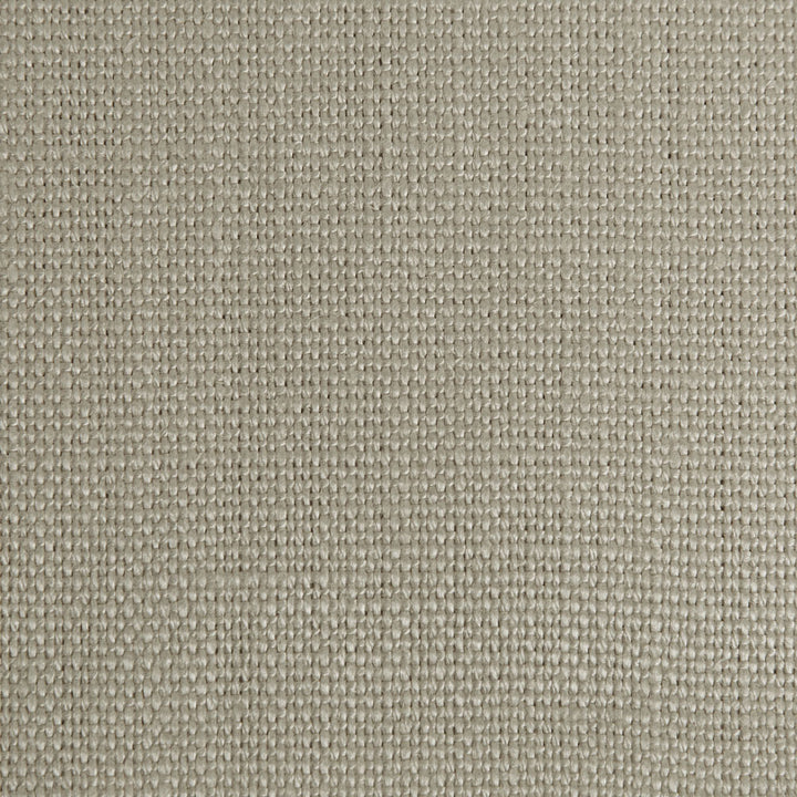 Close-up of a densely woven beige fabric with intricate texture.
