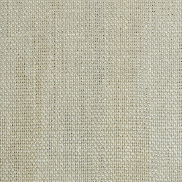 Close-up of a neutral textured fabric with a tight weave.