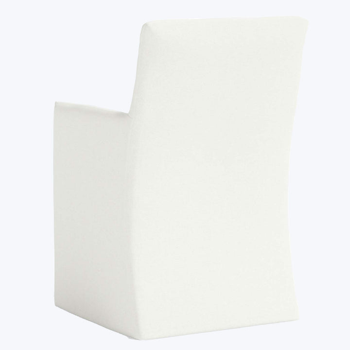 Modern white chair with sleek design, seamless back and seat.