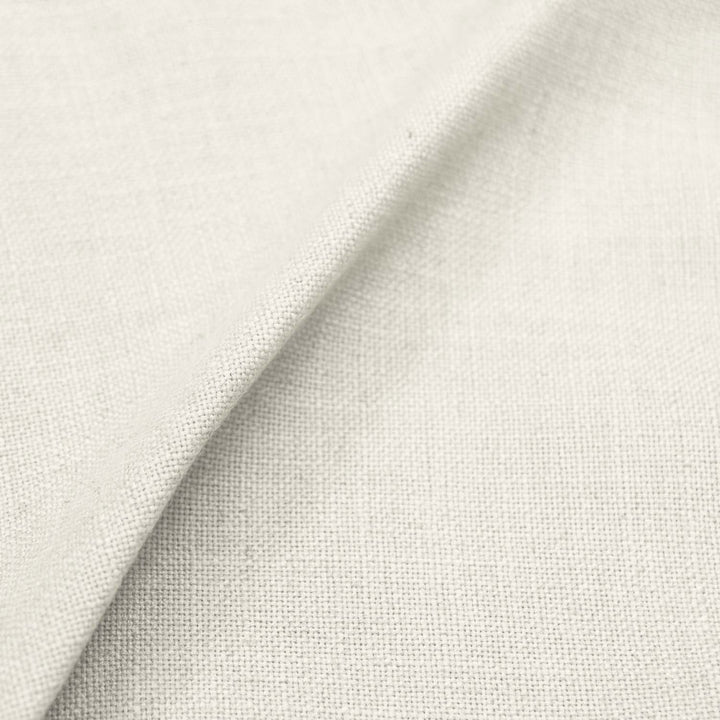 Textured off-white fabric with visible threads and soft sheen.